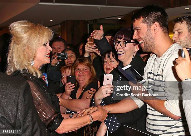 Joanna Lumley greets fans in the crowd as she arrives ahead of the Absolutely Fabulous: The Movie Melbourne premiere at Village Cinemas Crown on...