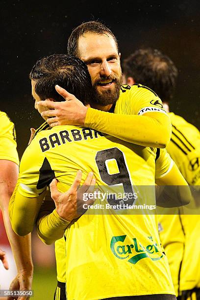 Kosta Barbarouses celebrates with Andrew Durante of the Phoenix after scoring a goal during the FFA Cup Round of 32 match between the Western Sydney...