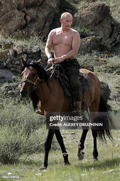 Putin Cal 189 Putin On Horse Stock Photos, High-Res Pictures, and Images - Getty ...