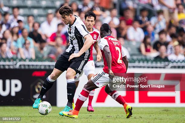 Juventus' player Alberto Cerri battles South China's player Agbo Wisdom Fofo during the South China vs Juventus match of the AET International...