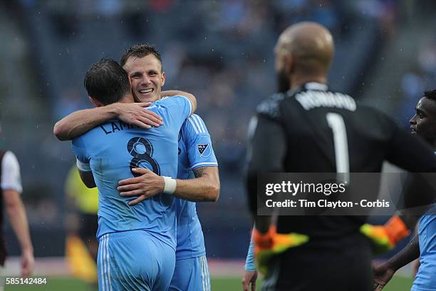 July 30: Goalkeeper Tim Howard of Colorado Rapids looks on as Frank Lampard of New York City FC is congratulated by team mate Frederic Brillant of...