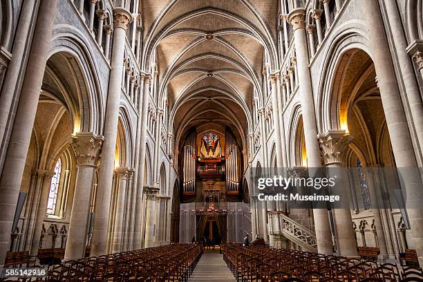 interior of the cathedral of notre dame from the chancel in lausanne - lausanne cathedral notre dame stock pictures, royalty-free photos & images