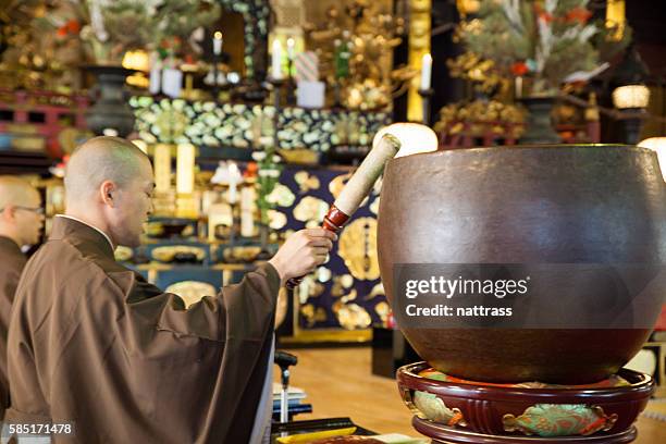 japanese monks praying and chanting in a buddhist temple - apostle of solitude stock pictures, royalty-free photos & images