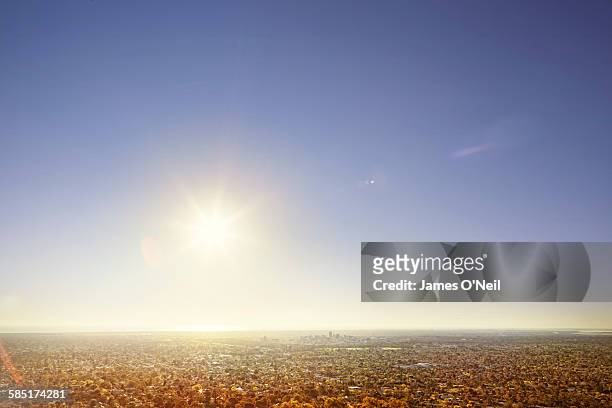 sunshine above adelaide city - alba crepuscolo foto e immagini stock