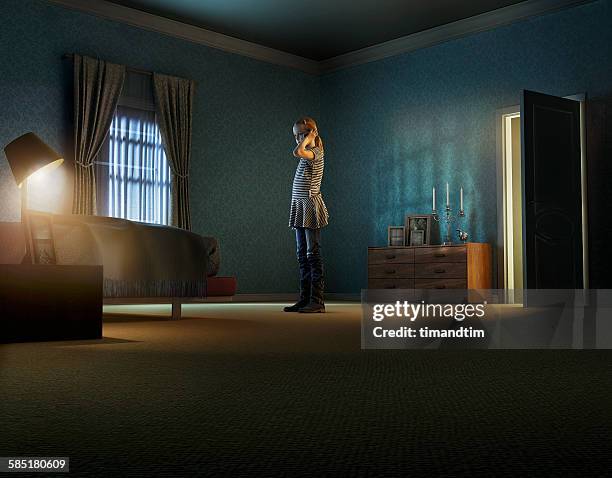 girl talking through smartphone in a room - camera bambino foto e immagini stock