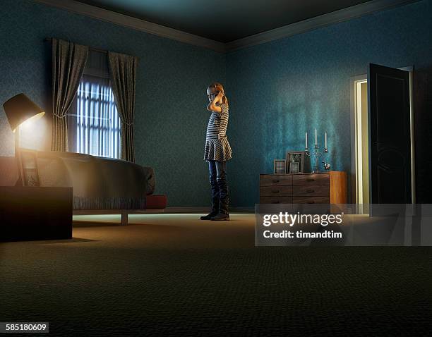 girl talking through smartphone in a room - spooky room stock pictures, royalty-free photos & images