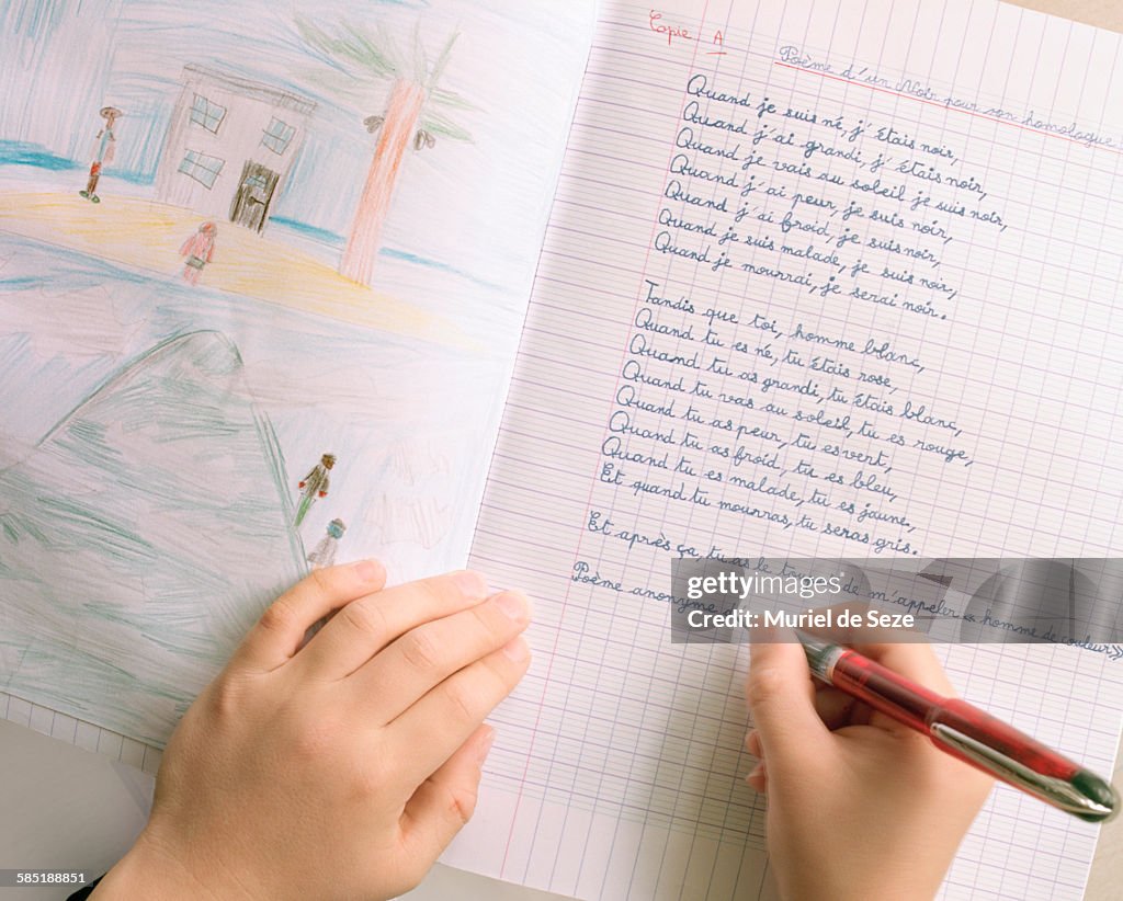 Child writing poem