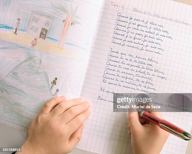 Child Writing Poem High-Res Stock Photo - Getty Images