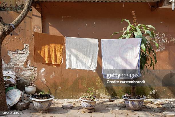 sheets hang out to dry - draped sheet stock pictures, royalty-free photos & images