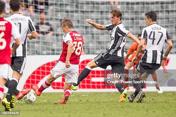 South China's player Griffiths Ryan Alan contests the ball during the South China vs Juventus match of the AET International Challenge Cup on 30 July...