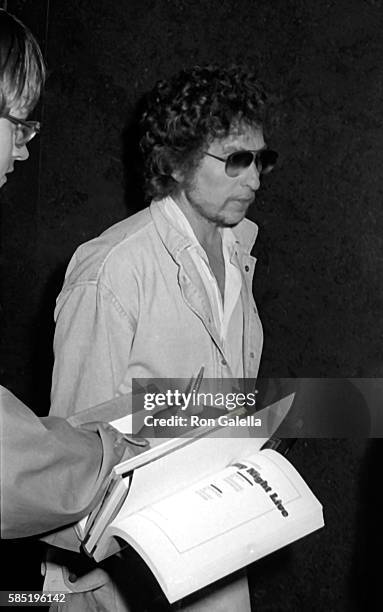 Bob Dylan with autograph-seeking fan reported to be Mark David Chapman on October 21, 1979 at NBC TV Studios in New York City.