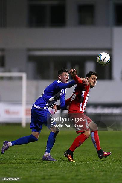 Blair Govan of Floreat Athena and Bruno Fornaroli of Melbourne City contest for the ball during the FFA Cup Round of 32 match between Floreat Athena...