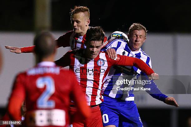 Jack Clisby and Connor Chapman of Melbourne City contest for a header against Kris Gate of Floreat Athena during the FFA Cup Round of 32 match...