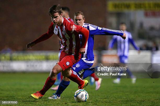 Connor Chapman of Melbourne City controls the ball against Kris Gate of Floreat Athena during the FFA Cup Round of 32 match between Floreat Athena...
