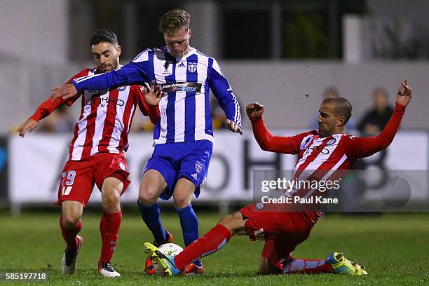 Manny Muscat of Melbourne City challenges Shaun Timmins of Floreat Athena during the FFA Cup Round of 32 match between Floreat Athena and Melbourne...