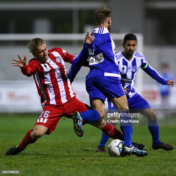 Luke Brattan of Melbourne City tackles Clayton Arnez of Floreat Athena during the FFA Cup Round of 32 match between Floreat Athena and Melbourne City...