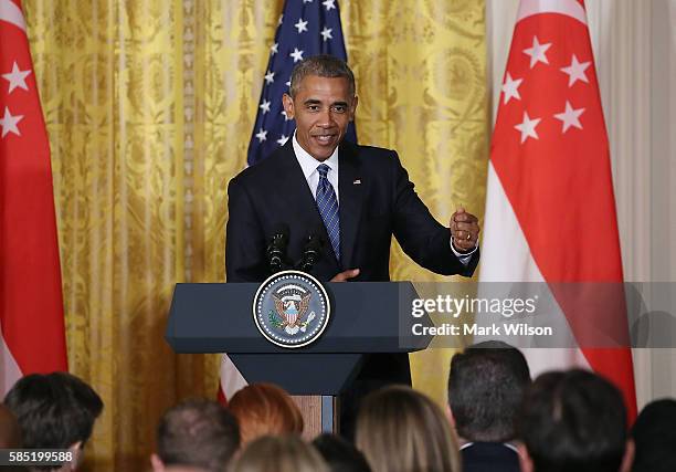 President Barack Obama, speaks about Republican Presidential candidate Donald Trump during a news conference with Singapore's Prime Minister Lee...