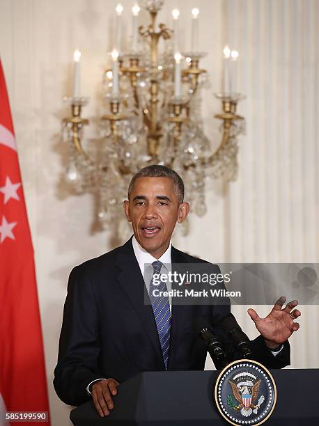 President Barack Obama, speaks about Republican Presidential candidate Donald Trump during a news conference with Singapore's Prime Minister Lee...