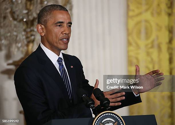 President Barack Obama, speaks about Republican Presidential candidate Donald Trump during a news conference with Singapore's Prime Minister Lee...