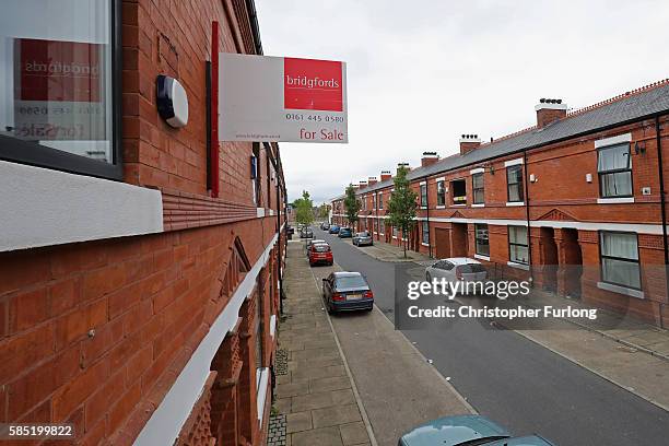 Renovated terraced homes in Hulme on August 2, 2016 in Manchester, England. Home ownership acroos the country has seen a sharp drop across Britain,...