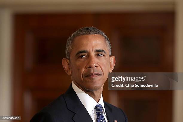 President Barack Obama participates in a joint news conference with Singapore's Prime Minister Lee Hsien Loong in the East Room at the White House...