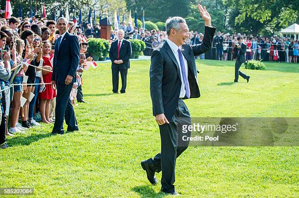 Prime Minister Lee Hsien Loong of Singapore greets guests during official welcoming ceremonies on the South Lawn of the White House on August 2, 2016...