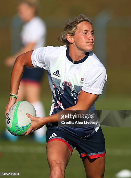 Claire Allan runs with the ball during the Great Britain Rugby 7's training session at Cruzeiro FC on August 1, 2016 in Belo Horizonte, Brazil.