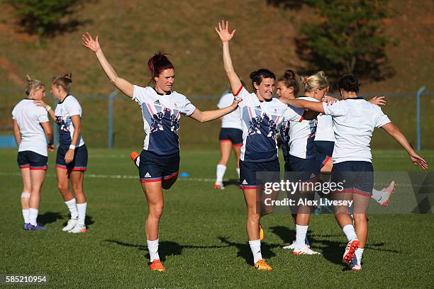Joanne Watmore and Alice Richardson warm up during the Great Britain Rugby 7's training session at Cruzeiro FC on August 1, 2016 in Belo Horizonte,...