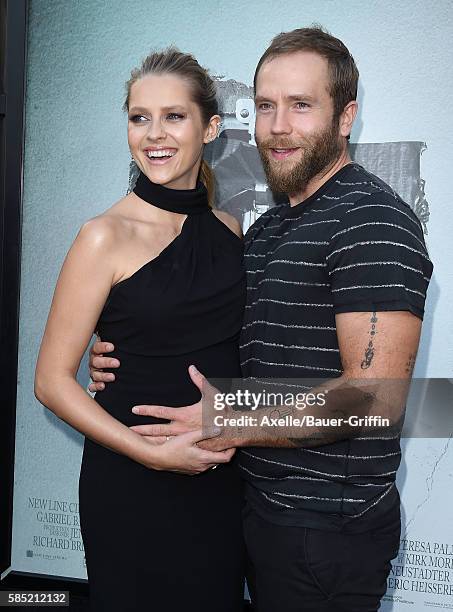 Actors Teresa Palmer and Mark Webber arrive at the premiere of New Line Cinema's 'Lights Out' at TCL Chinese Theatre on July 19, 2016 in Hollywood,...