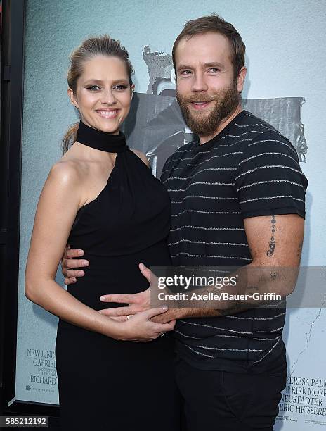 Actors Teresa Palmer and Mark Webber arrive at the premiere of New Line Cinema's 'Lights Out' at TCL Chinese Theatre on July 19, 2016 in Hollywood,...