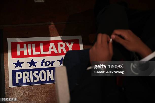 Hillary for Prison" sign is seen during a campaign event for Republican presidential nominee Donald Trump at Briar Woods High School August 2, 2016...