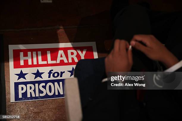 Hillary for Prison" sign is seen during a campaign event for Republican presidential nominee Donald Trump at Briar Woods High School August 2, 2016...