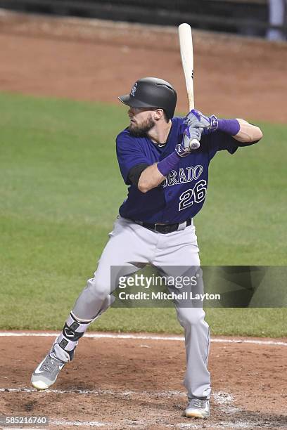 David Dahl of the Colorado Rockies prepares for a pitch during a baseball game against the Baltimore Orioles at Oriole Park at Camden Yards on July...