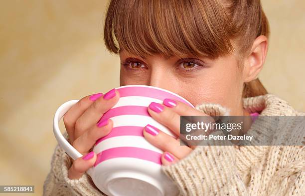 woman with cold and flu drinking soup - drinking cold drink stock pictures, royalty-free photos & images
