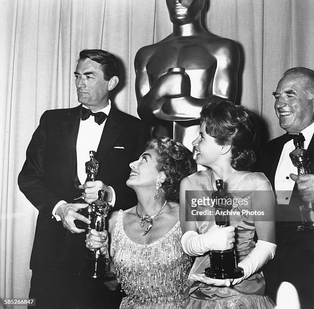 Actors Gregory Peck, Joan Crawford , Patty Duke And Ed Begley with their Oscars, at the 35th Academy Awards, Los Angeles, April 8th 1963.