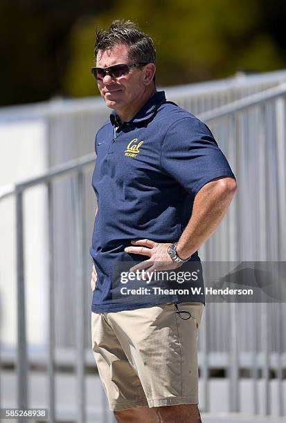 University of California Rugby coach and former player Tom Billups looks on as the Harlequins rugby team practice at San Francisco Golden Gate RFC on...