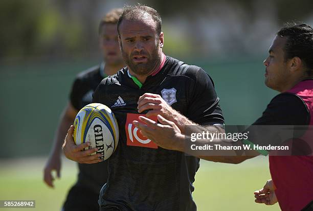 Jamie Roberts center of Harlequins runs with the ball during a team practice at San Francisco Golden Gate RFC on August 2, 2016 in San Francisco,...