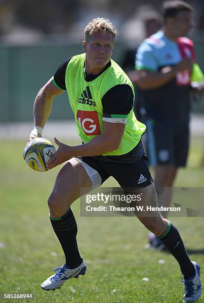 Matt Hopper center of Harlequins runs with the ball during a team practice at San Francisco Golden Gate RFC on August 2, 2016 in San Francisco,...
