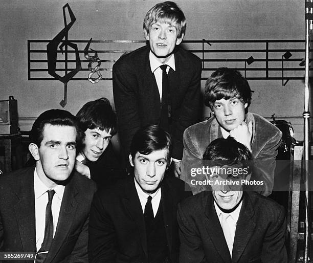 Portrait of the band 'The Rolling Stones'; Brian Jones, Mick Jagger, Bill Wyman, Charlie Watts, Keith Richards and Ian Stewart, circa 1963.