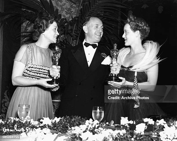 Actresses Fay Bainter and Bette Davis holding their acting Oscars for the film 'Jezebel', at the 11th Academy Awards, Los Angeles, February 23rd 1939.