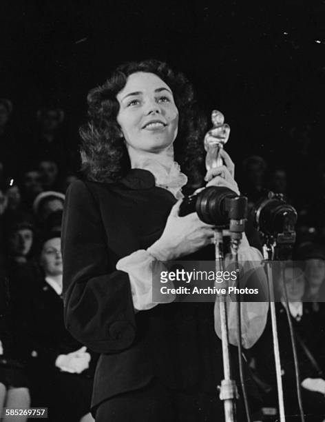 Actress Jennifer Jones receiving her Best Actress Oscar for the film 'The Song for Bernadette', at the 16th Academy Awards, Los Angeles, March 2nd...