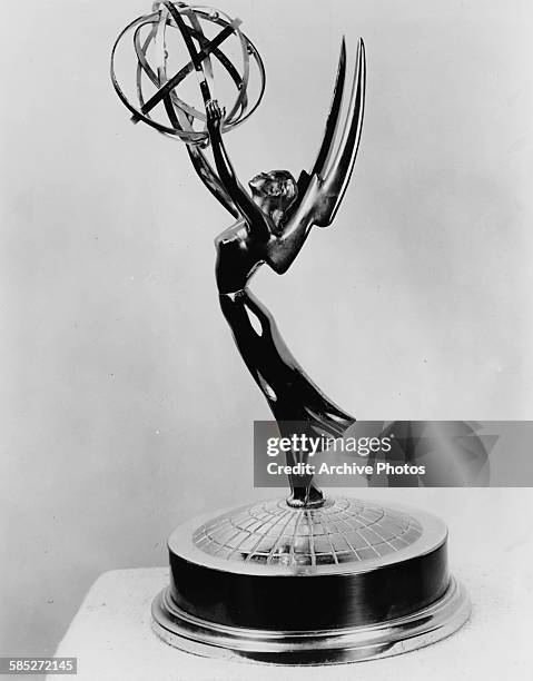 An Emmy Award statuette, depicting a winged woman holding an atom, designed by Louis McManus in 1948.