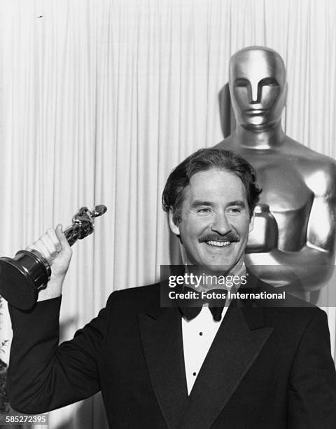 Actor Kevin Kline holding his Oscar statuette, after winning the best supporting actor award for the film 'A Fish Called Wanda', at the 61st Academy...