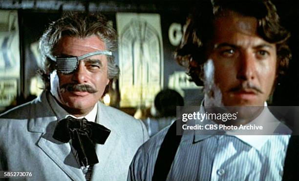 Theatrical movie originally released December 23, 1970. The film directed by Arthur Penn. Pictured left to right, Martin Balsam , and Dustin Hoffman...