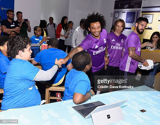 Real Madrid C.F. Player Marcelo Vieira da Silva Junior and teammates surprise Minecraft Hour of Code workshop participants at the Microsoft Store on...