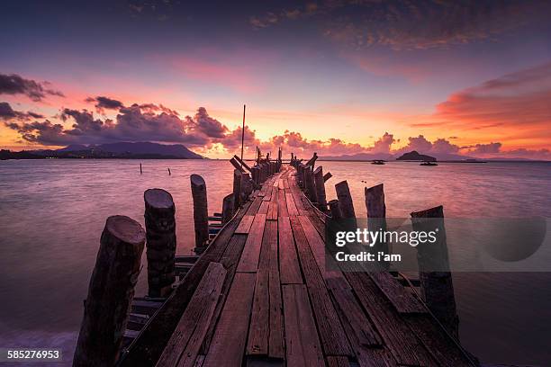 jetty at the sunset - kedah stock pictures, royalty-free photos & images