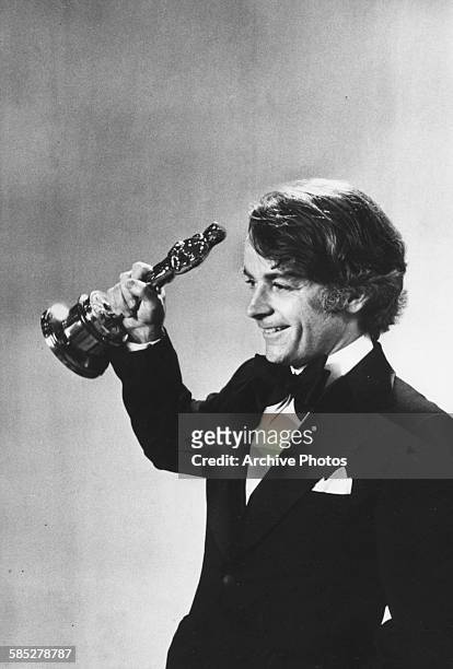 Director John G Avildson with his Oscar for the film 'Rocky', at the 49th Academy Awards, Los Angeles, March 28th 1977.