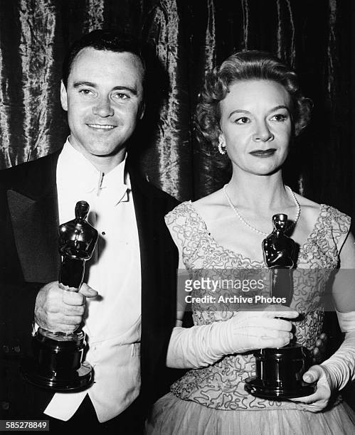 Actors Jack Lemmon and Jo Van Fleet holding their Oscars at the 28th Academy Awards, Los Angeles, March 21st 1956.