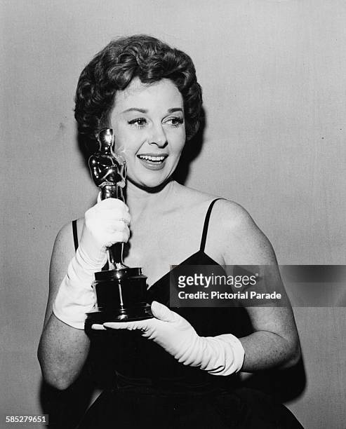 Actress Susan Hayward holding her Best Actress Oscar for the film 'I Want to Live!', at the 31st Academy Awards, April 6th 1959.