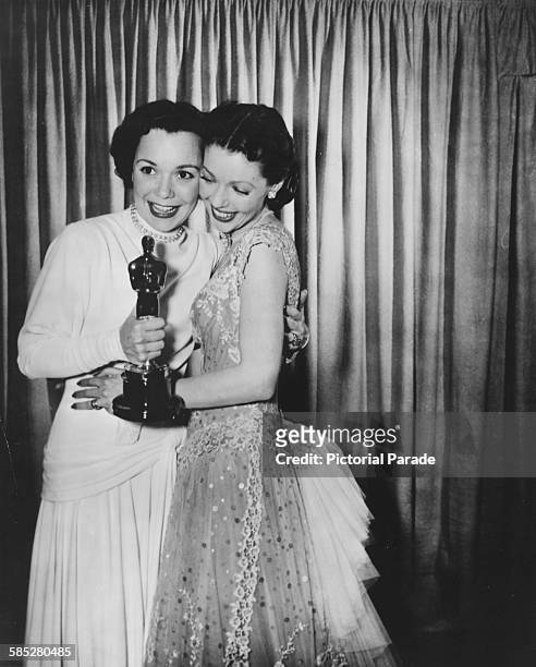 Loretta Young congratulating actress Jane Wyman on her Best Actress Oscar for the film 'Johnny Belinda', at the 21st Academy Awards, Los Angeles,...